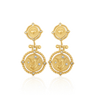 Gold earrings with intricate designs on a white background